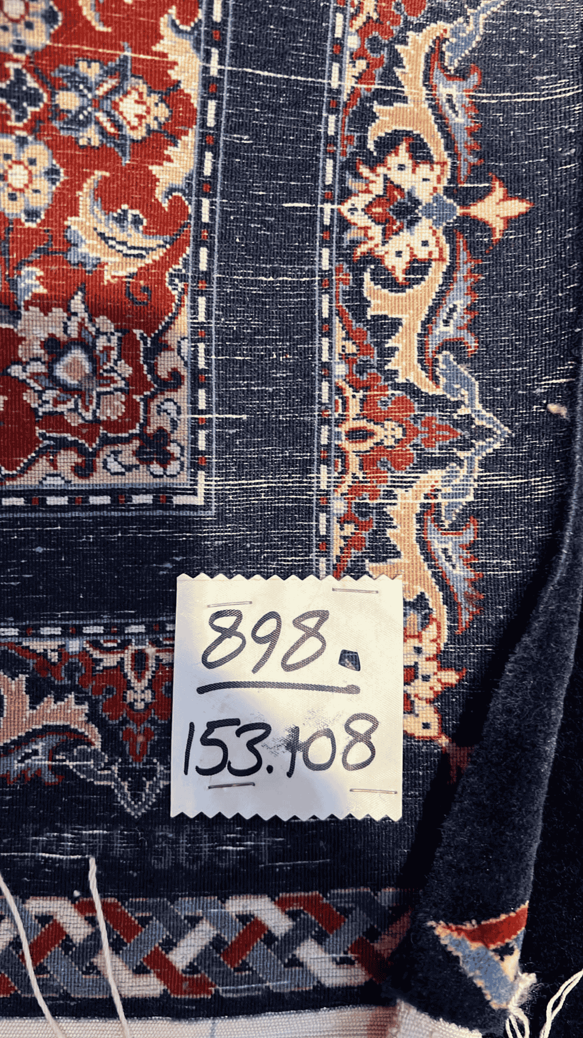 "Backside of a Farzad Seirafian Persian rug, displaying the fine knot structure and craftsmanship, handwoven in Isfahan with silk warp and wool pile."